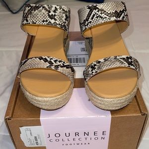Journee Collection black wedge size 9 , brand new in its box .